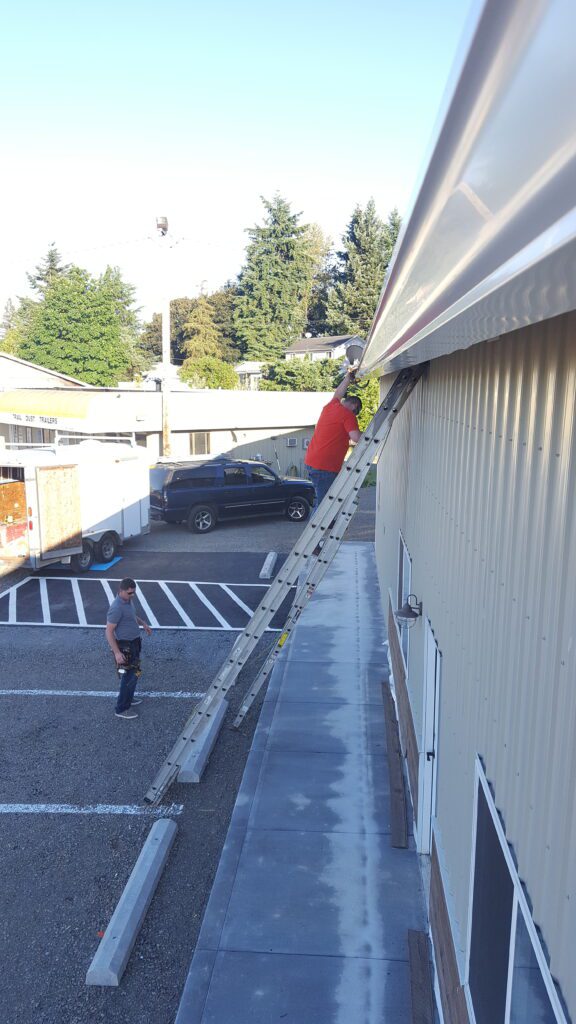 Installing gutter on the Boring Brew in Boring OR