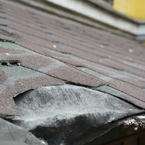 major damage to asphalt shingle roofing