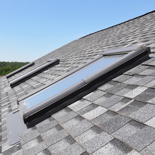 close-up of skylights in a shingle roof