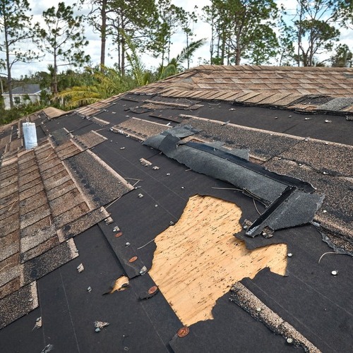 close-up of a storm damaged roof
