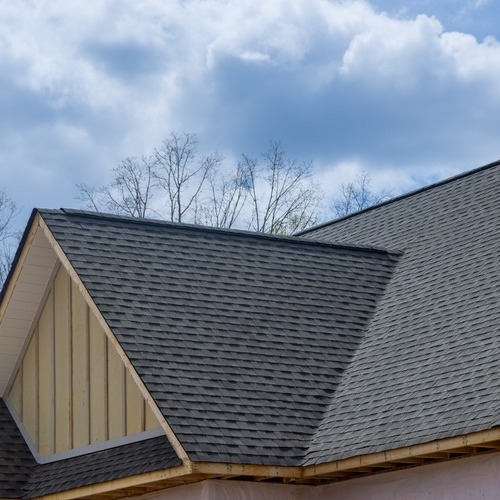a home with a shingle roofing system