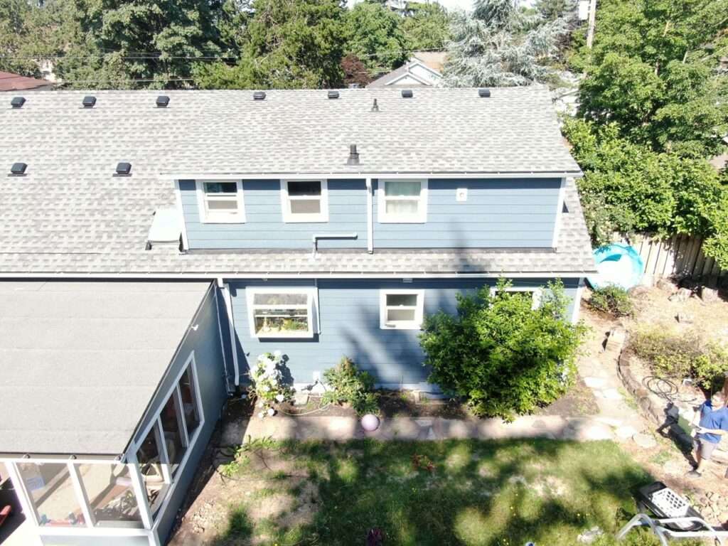 Complete exterior home renovation featuring premium siding replacement and a new roof in Southeast Portland, Oregon by Armadas Exterior.