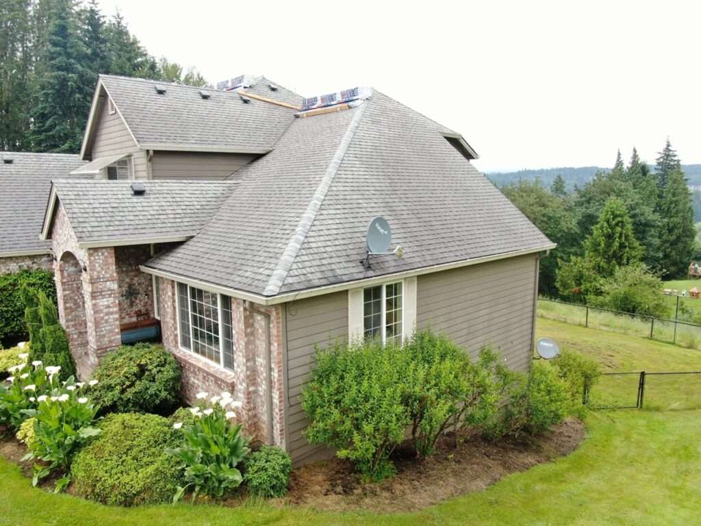 High-efficiency home exterior remodel showing advanced weatherization, new siding, and roof replacement in Ridgefield, Washington by Armadas Exterior.