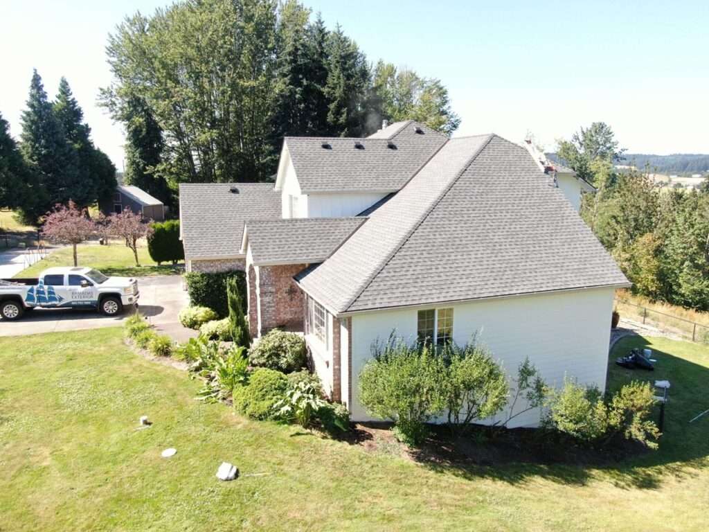 Premium home exterior remodel showcasing expert roofing and durable siding installation in Ridgefield, Washington by Armadas Exterior.