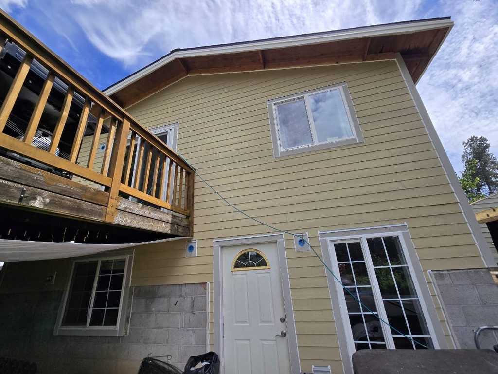 Back of the house now has the siding complete and ready for paint