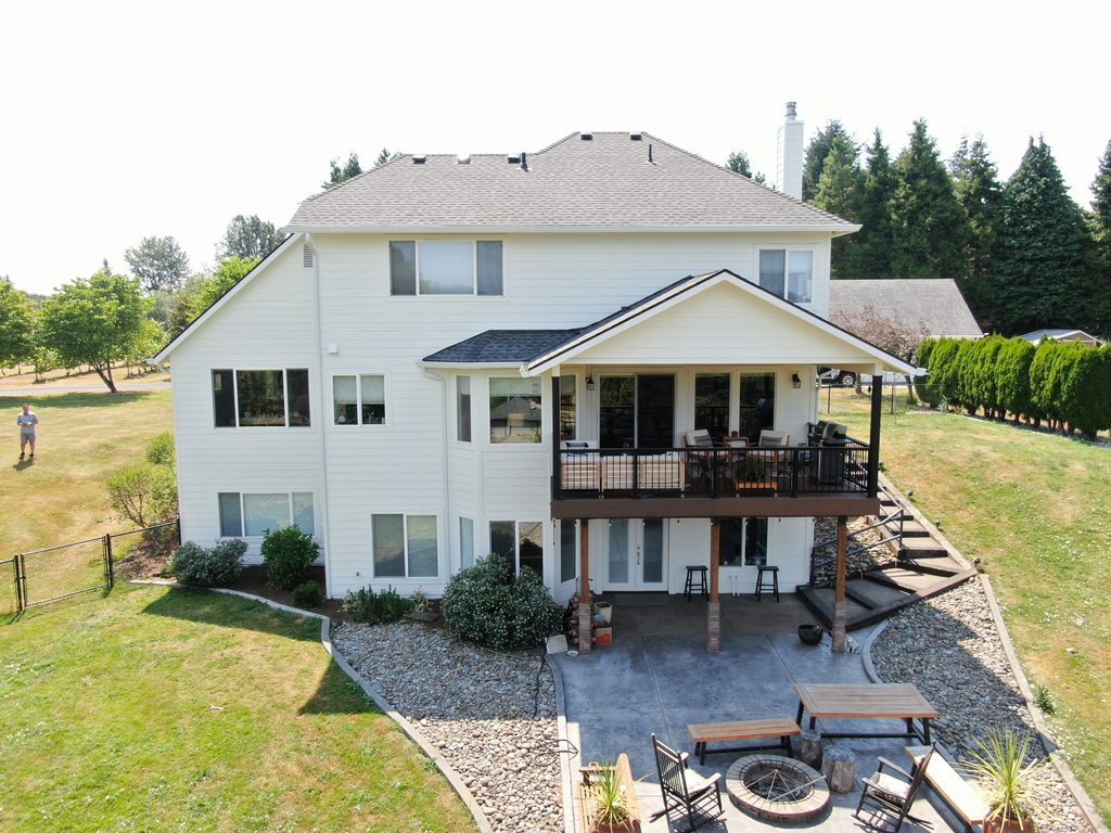 Roofing, gutters, siding, and paint are all done on the back of the house.