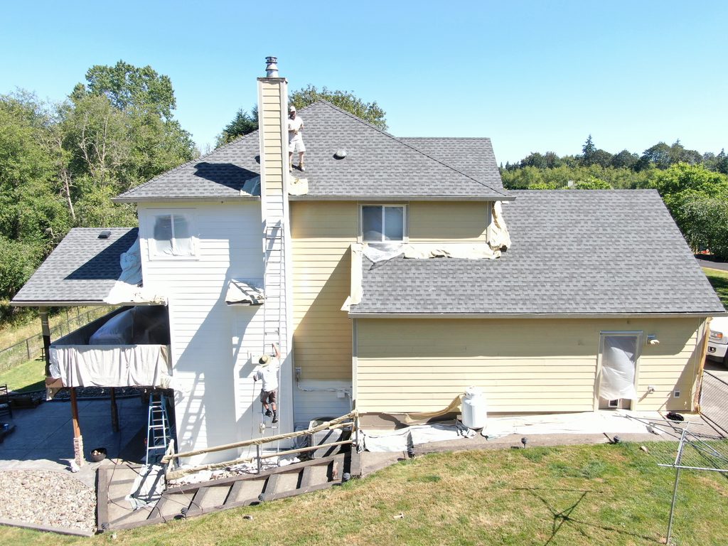 siding is complete and painting is in process.