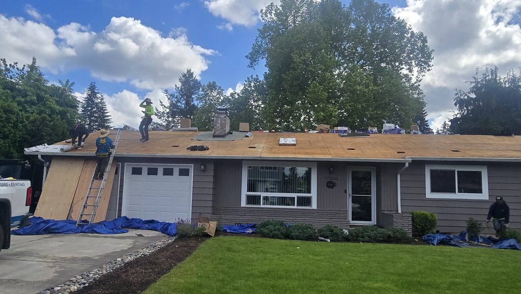 Roof replacement underway on the Kerr home in Happy Valley, Oregon