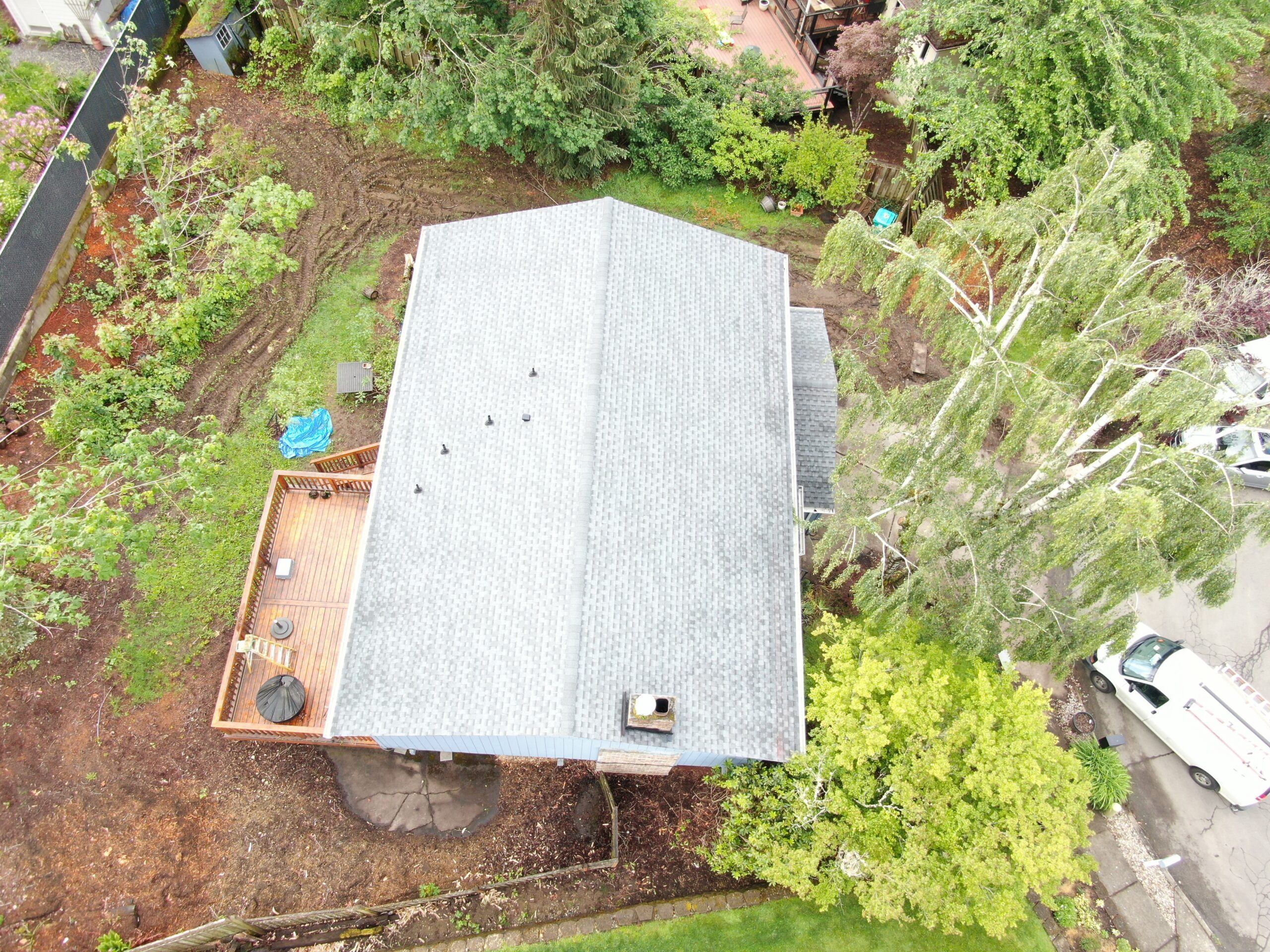Aerial view of the completed Gresham roof replacement after structural storm-damage repairs