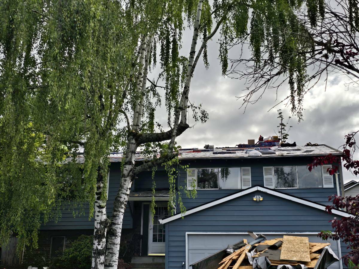 GAF roofing installation underway after structural and decking repairs on the Gresham home