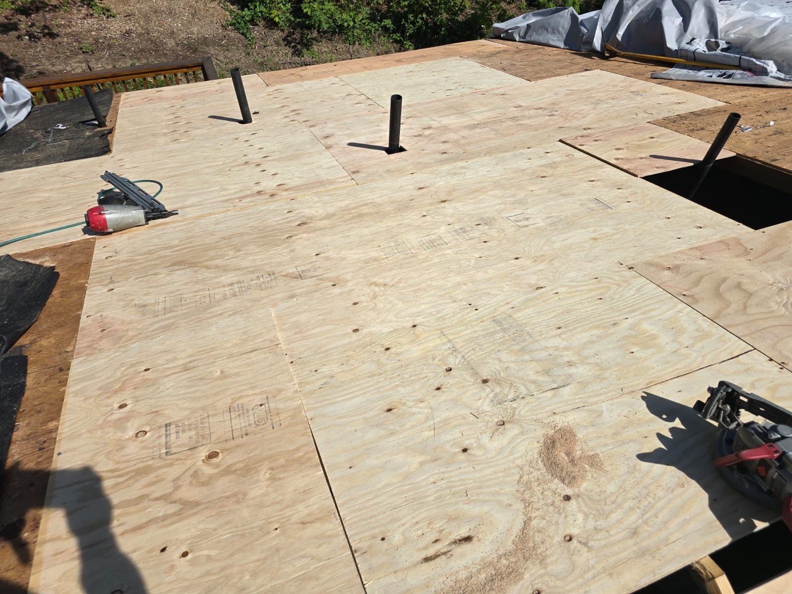New plywood roof decking installed during the Nelson storm-damage roof rebuild in Gresham